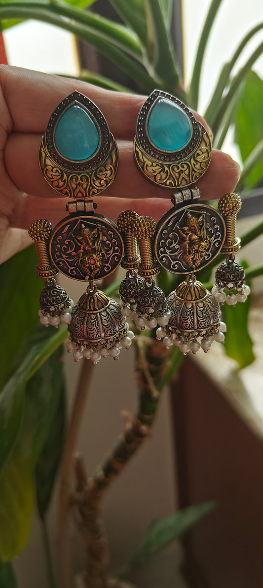 Dual tone multiple jhumkis with Ganesha