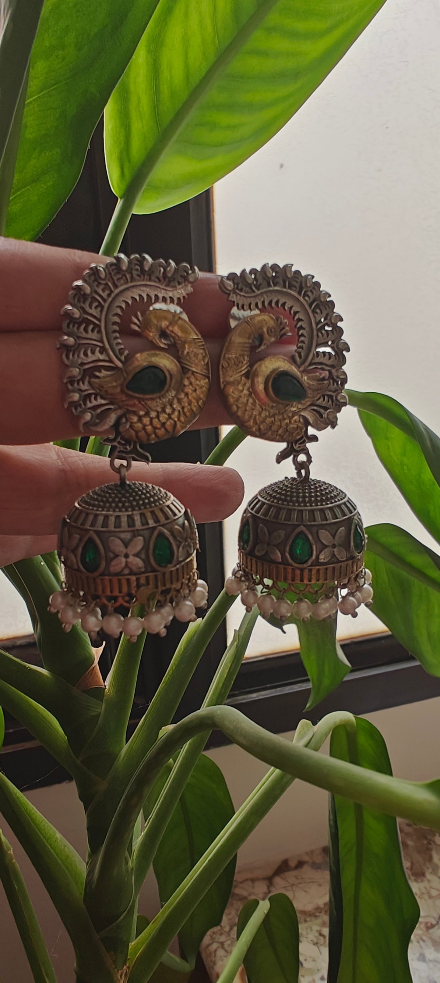 Dual tone peacock jhumkas with stone