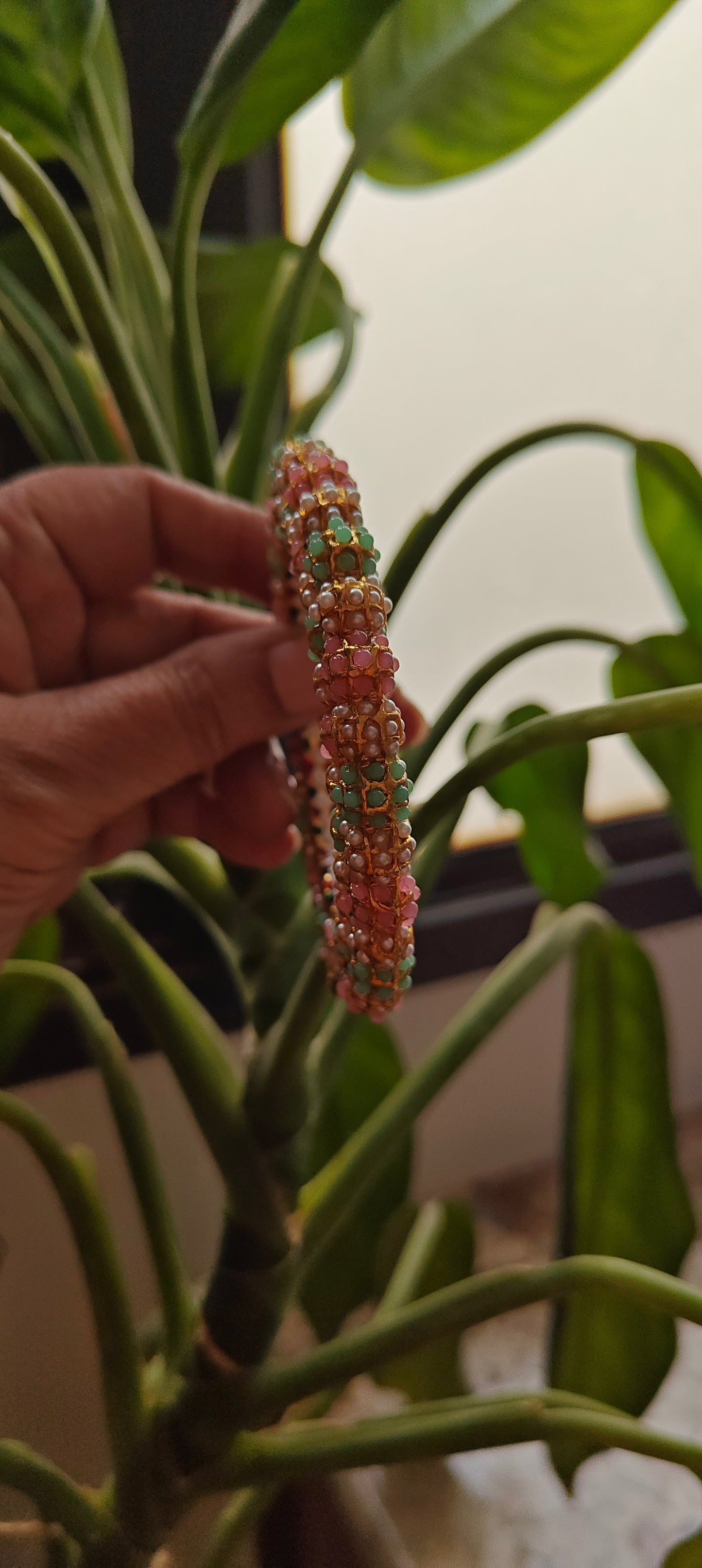 Double layered kara(Bangle) with coloured stone embedded.