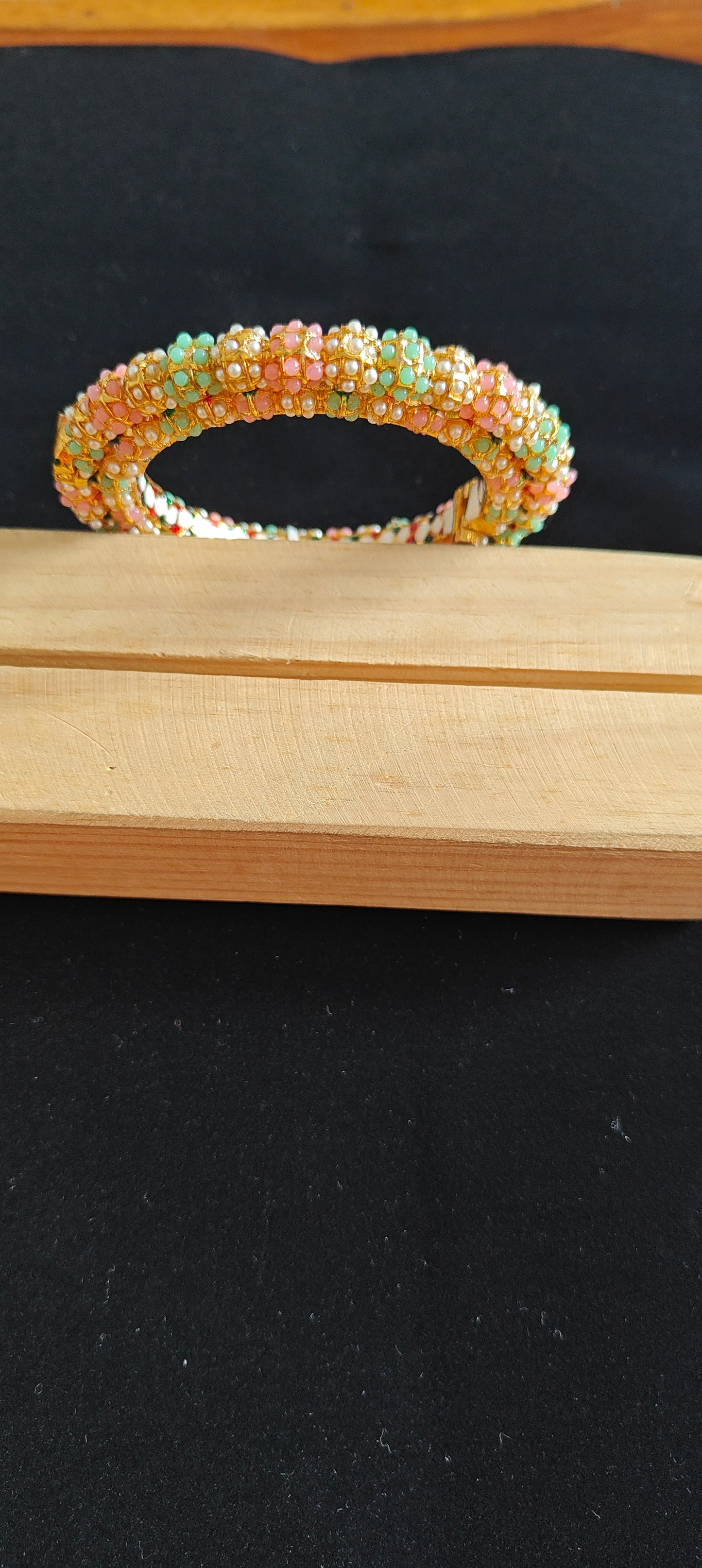 Double layered kara(Bangle) with coloured stone embedded.