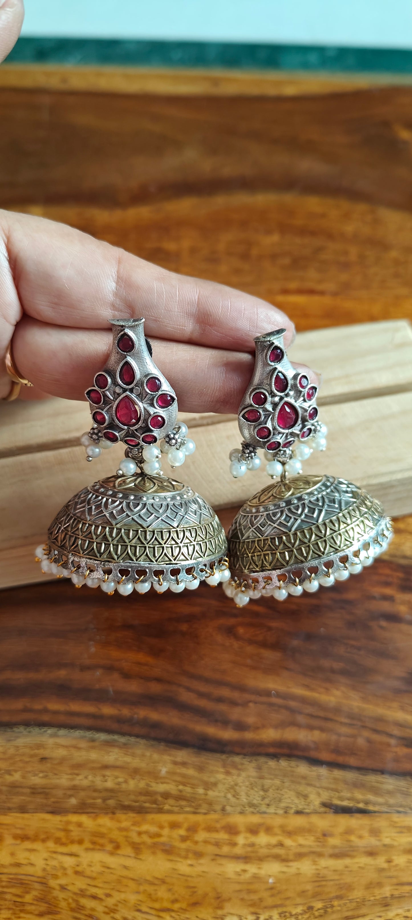 Dual tone jhumkis with stones on stud