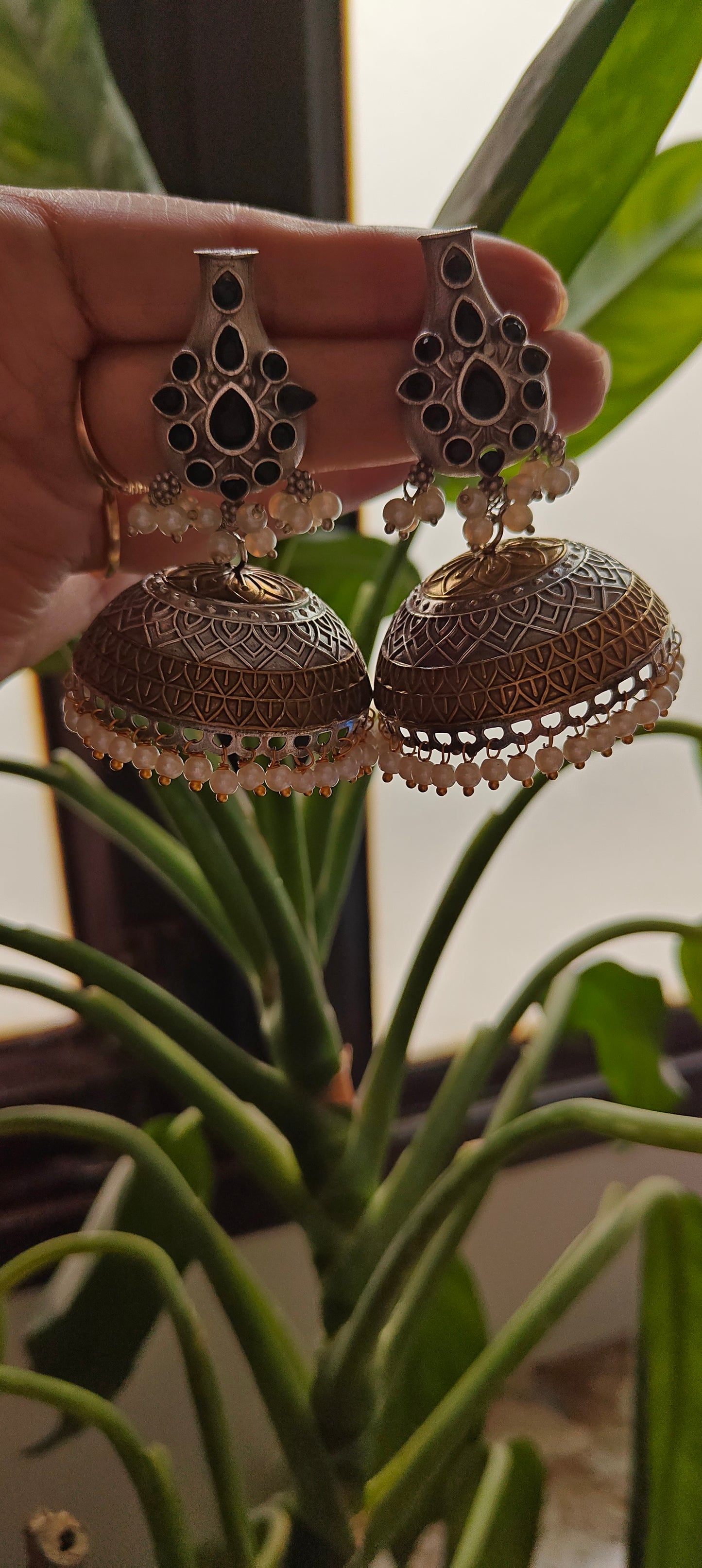 Dual tone jhumkis with stones on stud