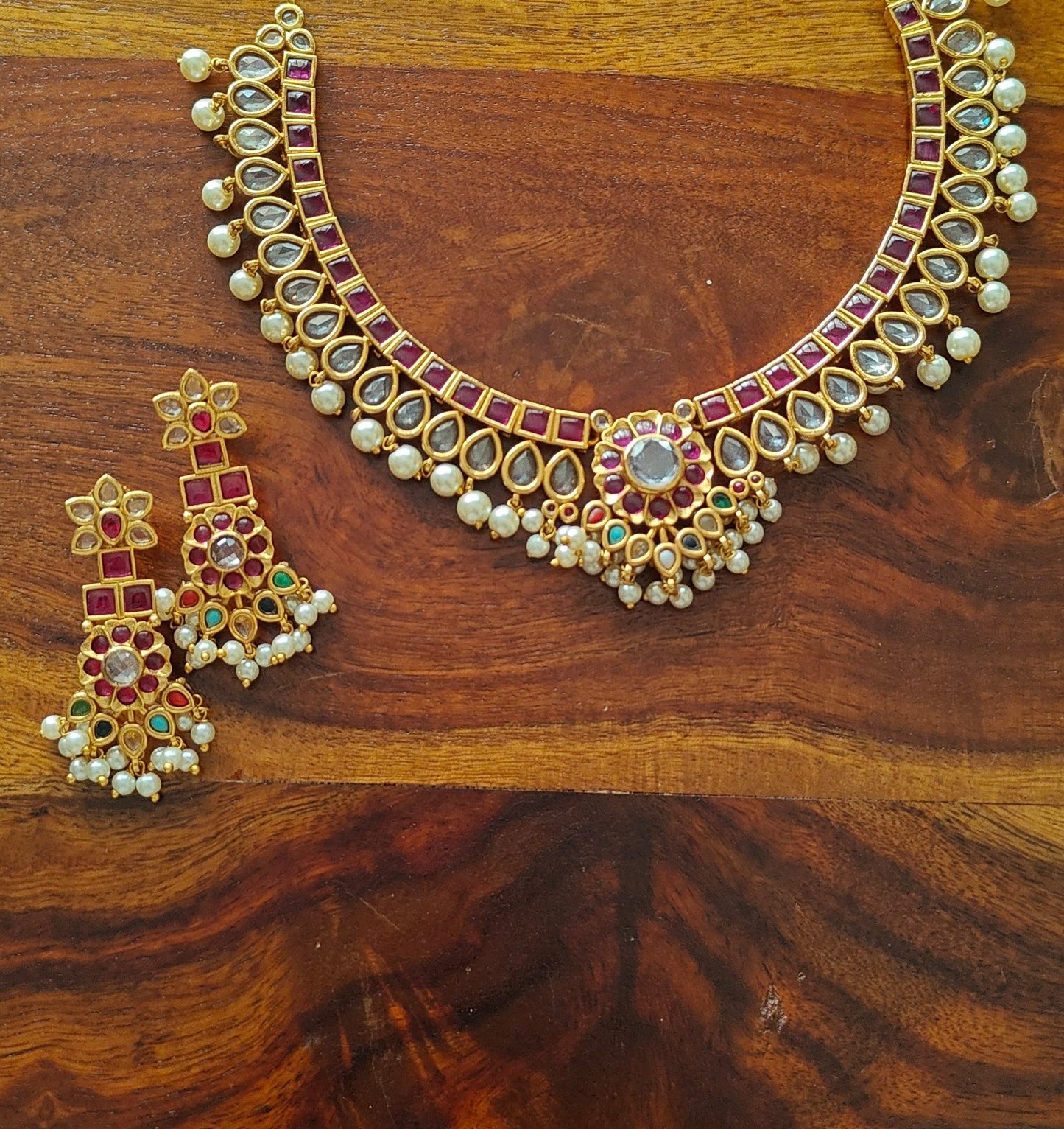 Avani kemp and transparent stone set