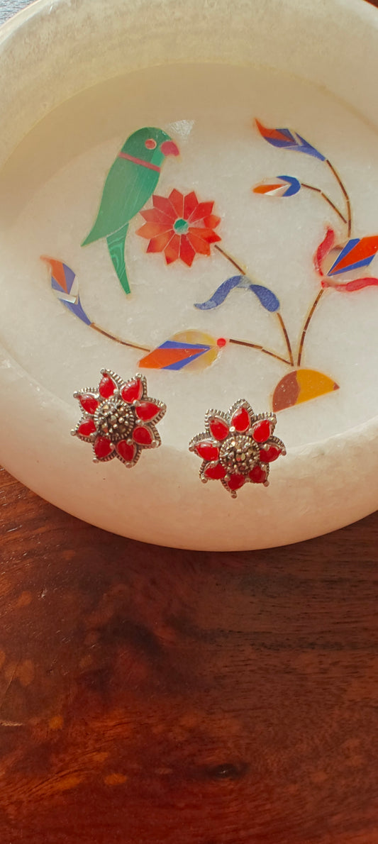 Wildflower silver stud earrings with ruby red stone petals