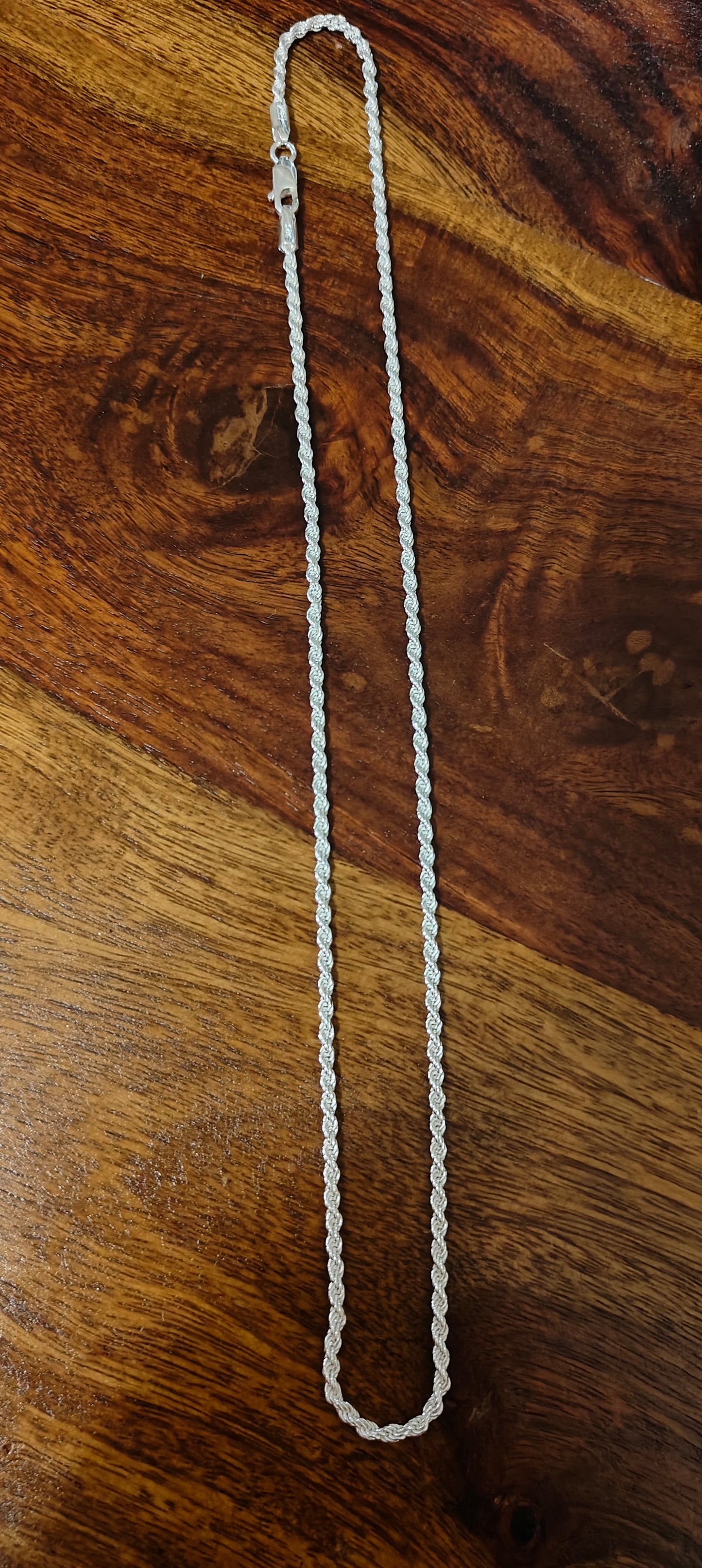 Silver chain with a thick twisted rope design