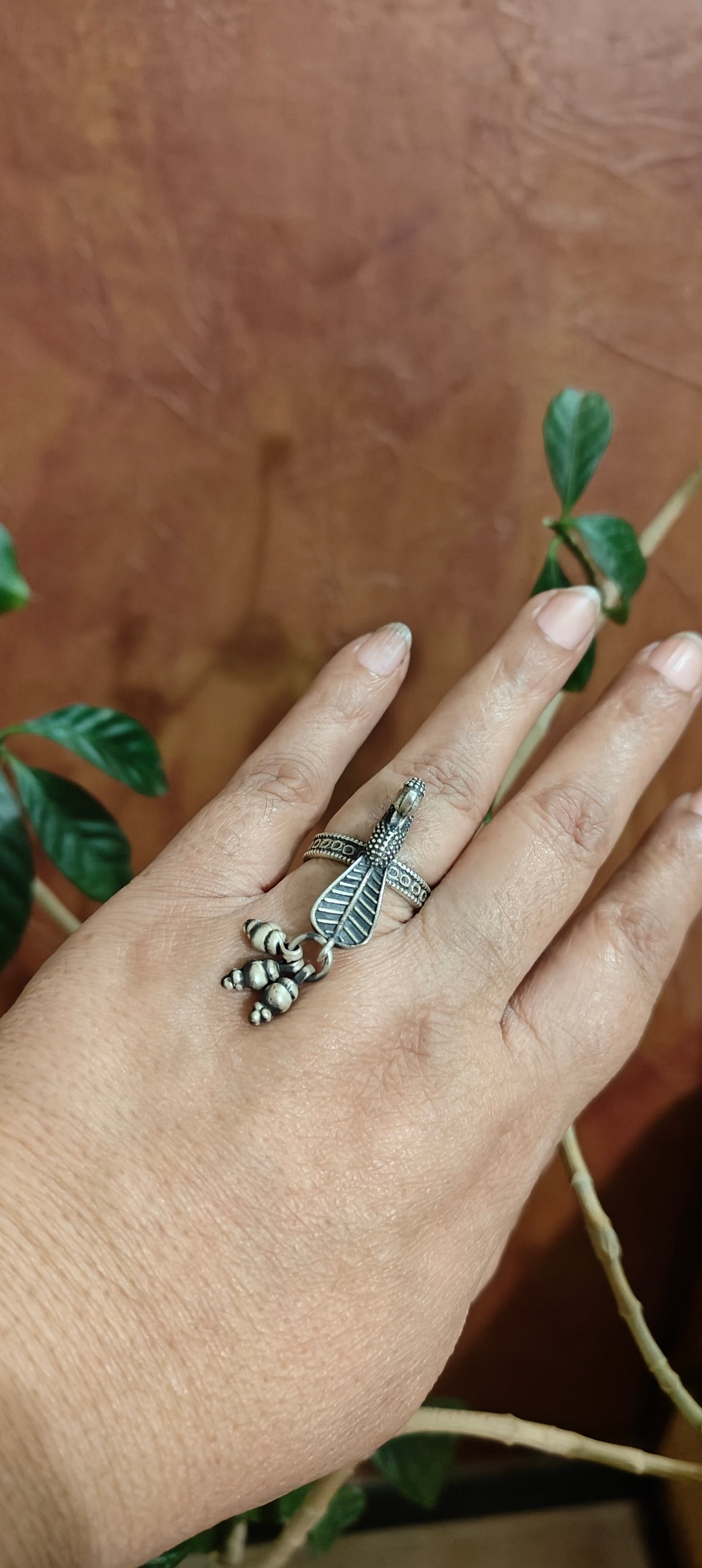 Silver ring with perched peacock with ghungroos