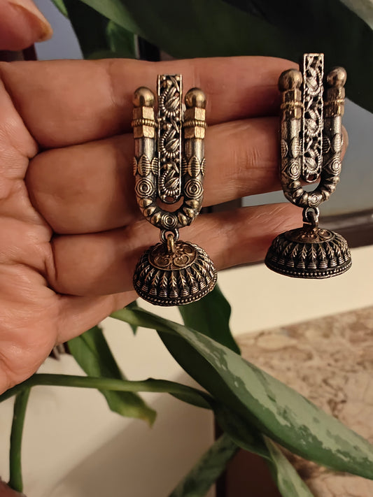 Dual tone jhumkis below U shaped stud