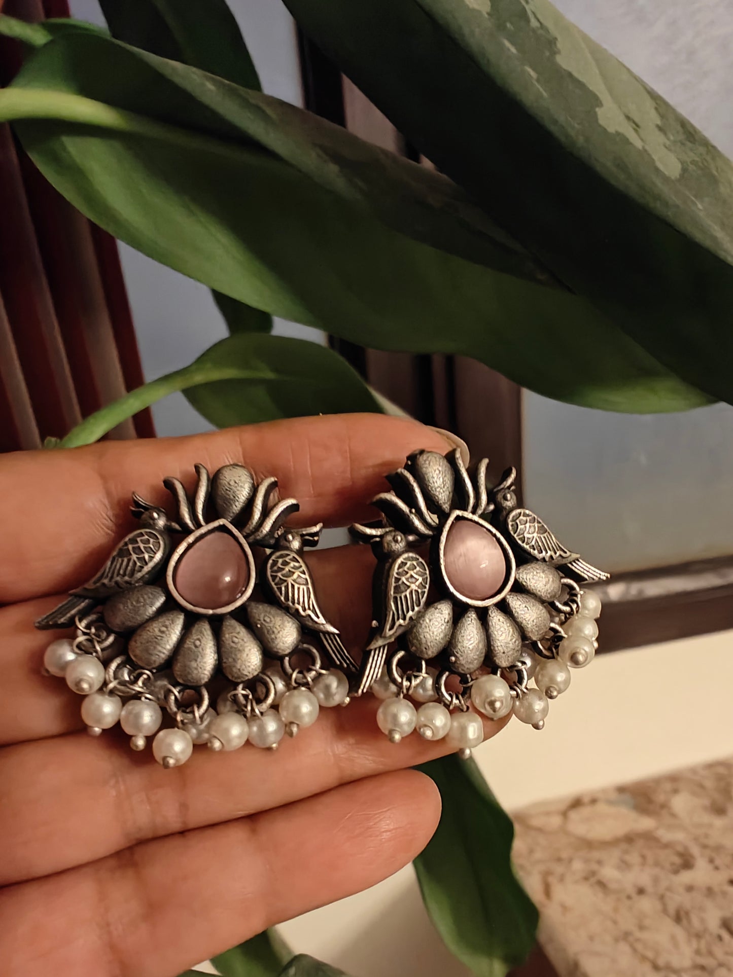 Studs(earrings)with mint green/ pint stone