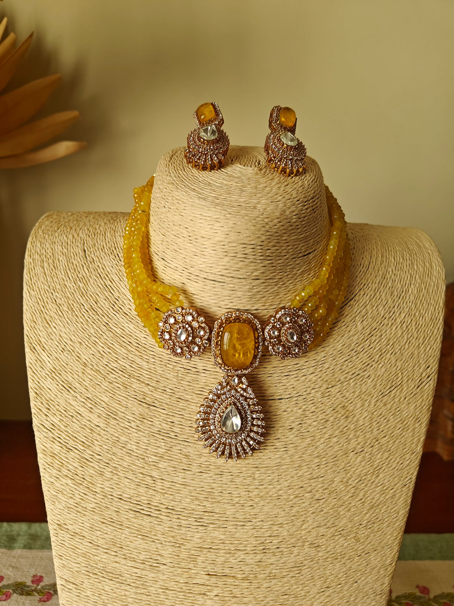 Padmal five strings choker set with central piece with stone and moissanite