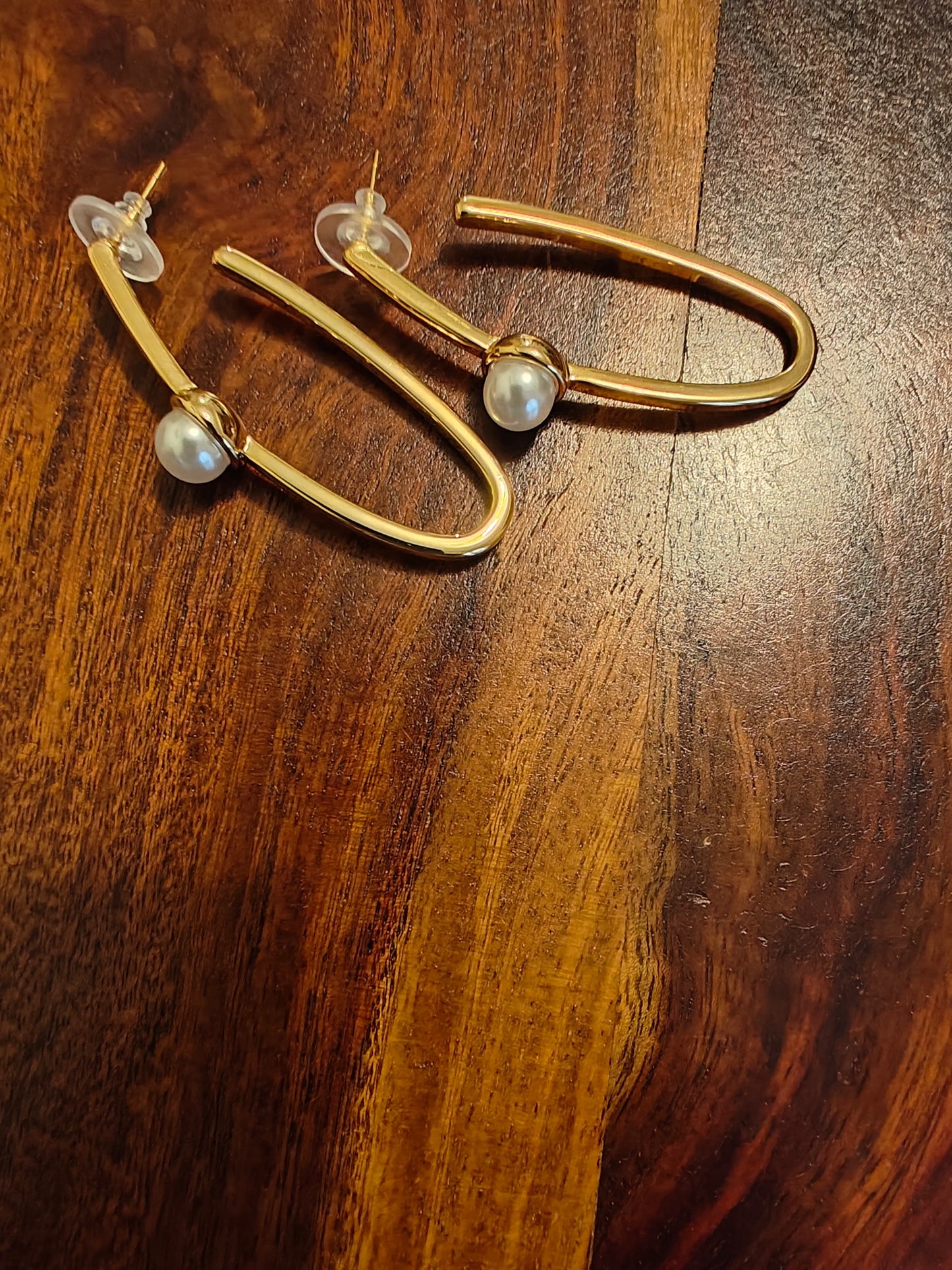 Gold hoop earrings with pearl