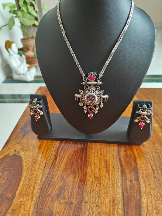 Kuyil set in dual tone with deers and kemp stones