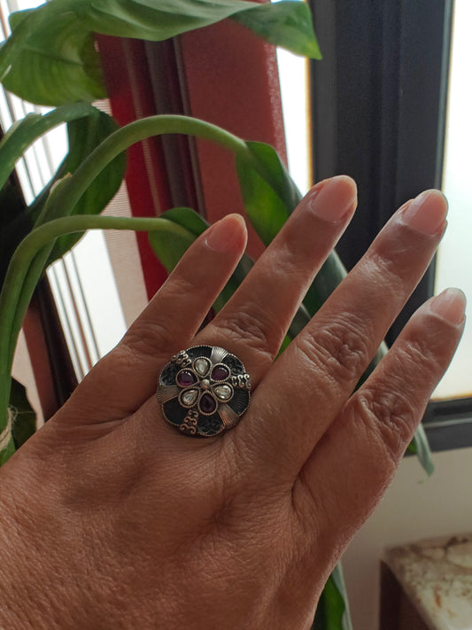 Sterling silver ring with ruby red and transparent stone in antique finish