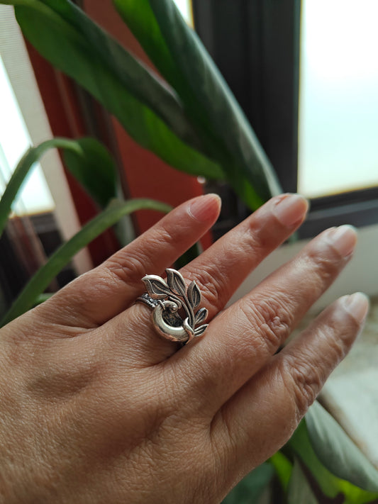 Sterling silver ring with perched peacock
