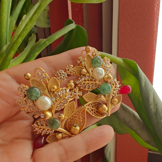 Elaborate twig and stone flower earrings