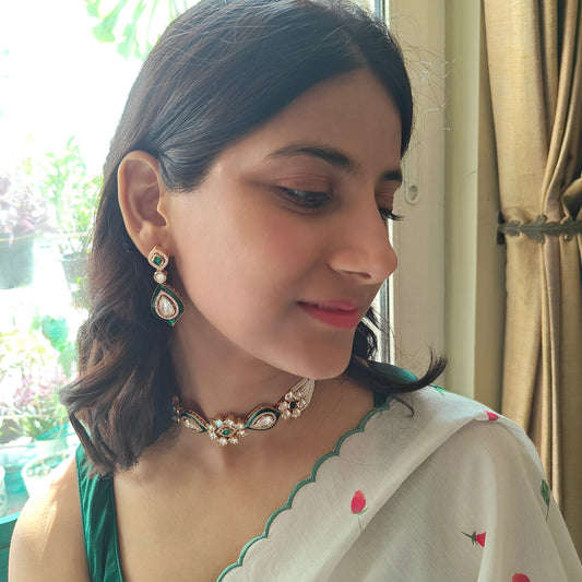 Isai choker set with kundan on poth pearl strings