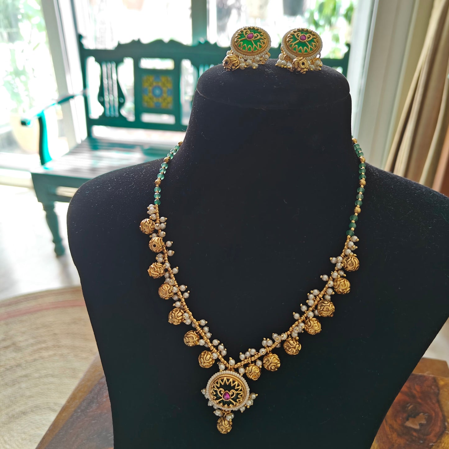 Ratnali set with green stone and gold work