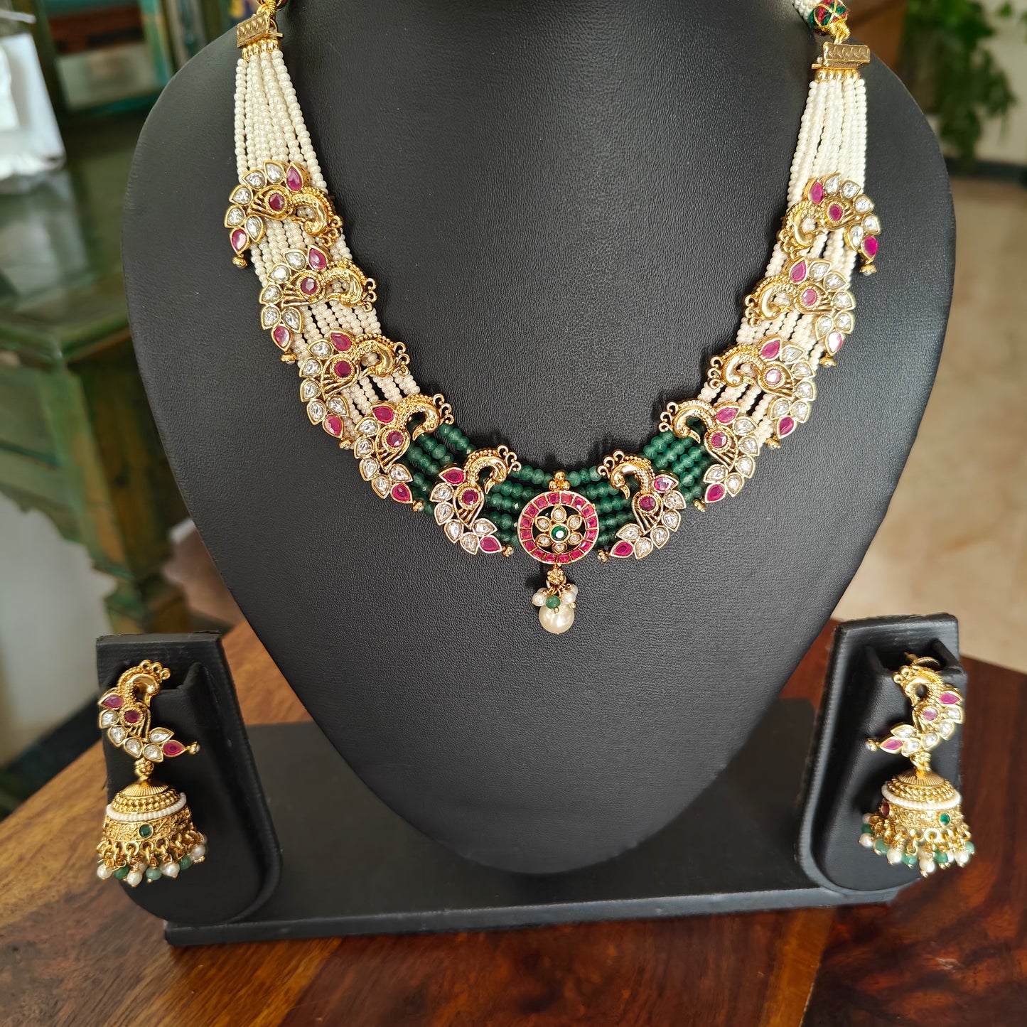 Kishori set with peacocks on poth pearl strings