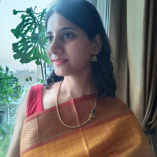 Omana set with side stone piece and jhumkis