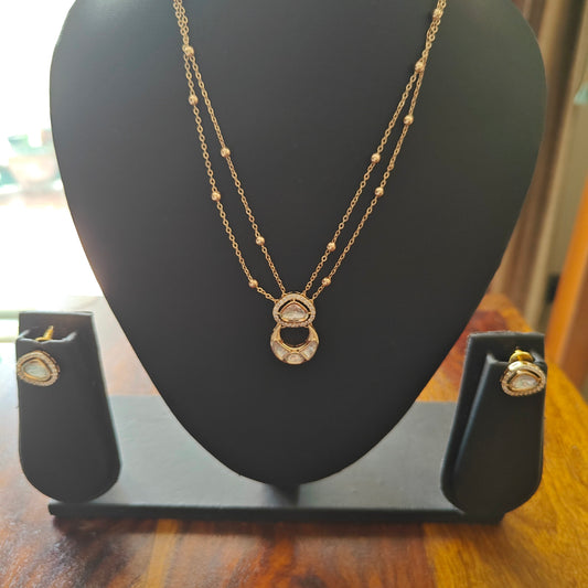 Delicate Nimisha set with suspended kundan pieces