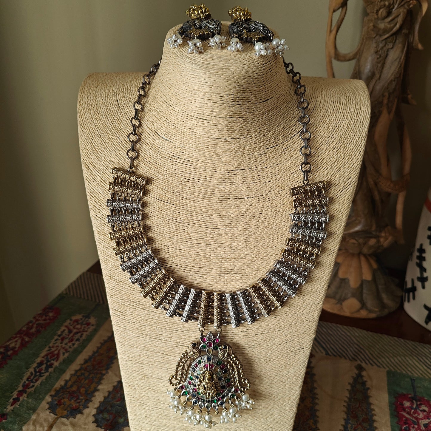 Dual tone necklace set with lakshmi pendant