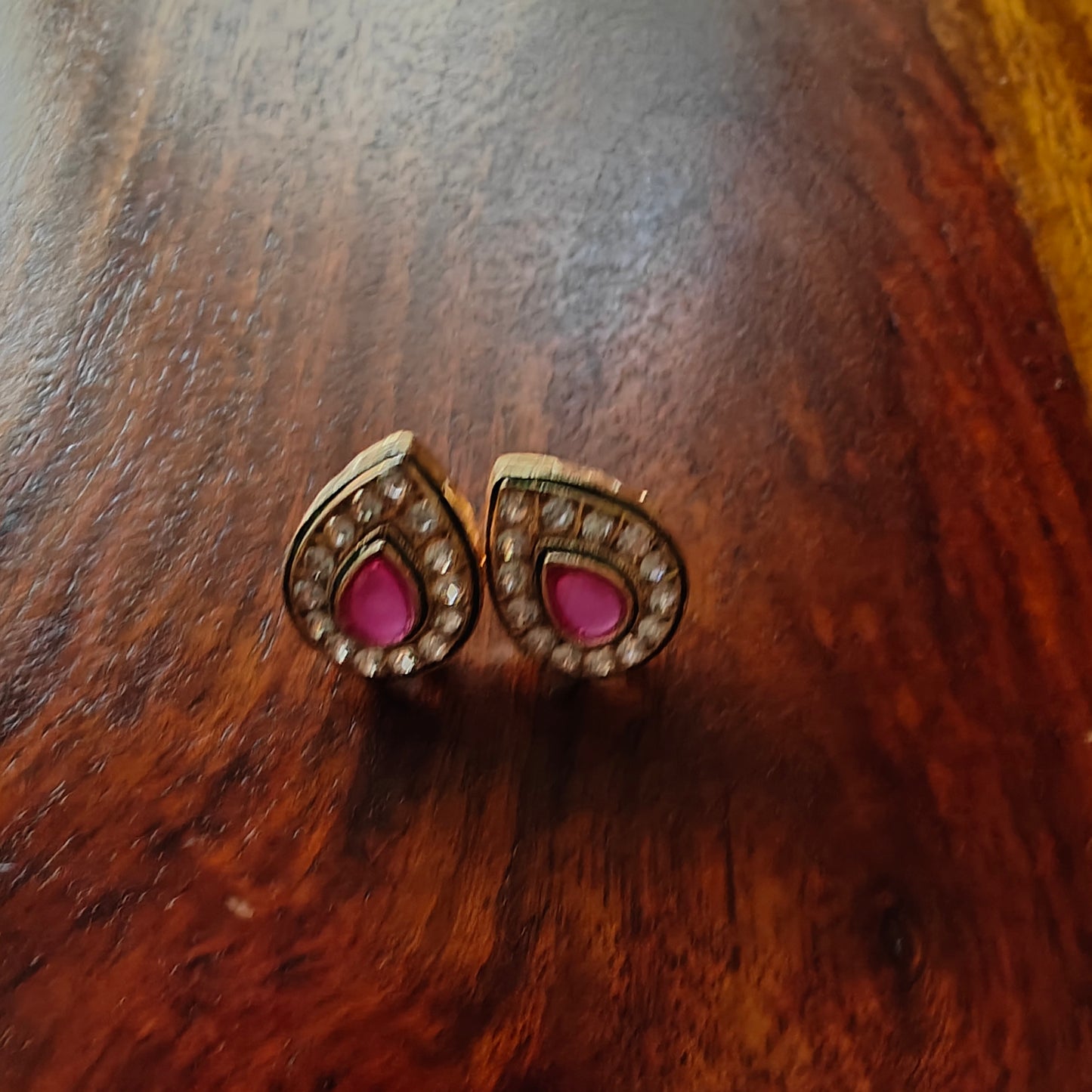 Tear drop shaped studs with stone centre and cz all around
