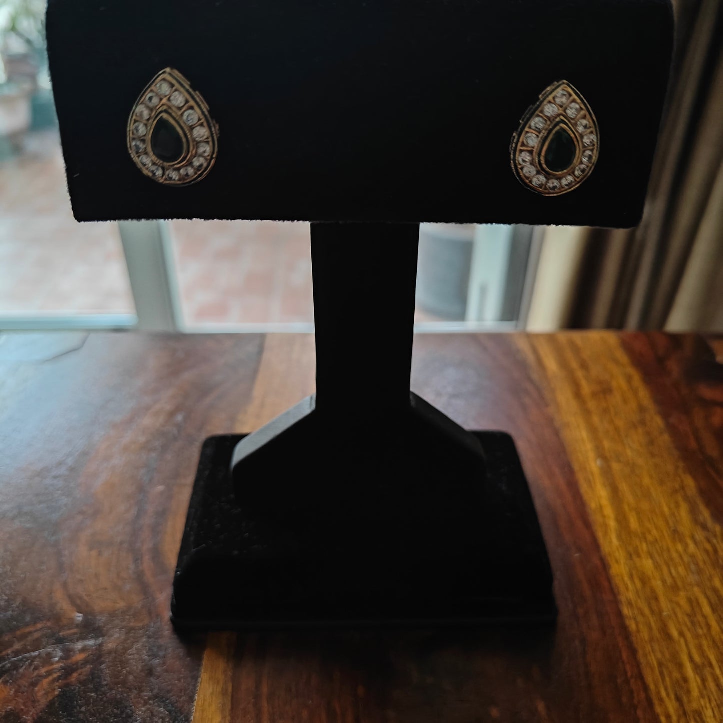 Tear drop shaped studs with stone centre and cz all around
