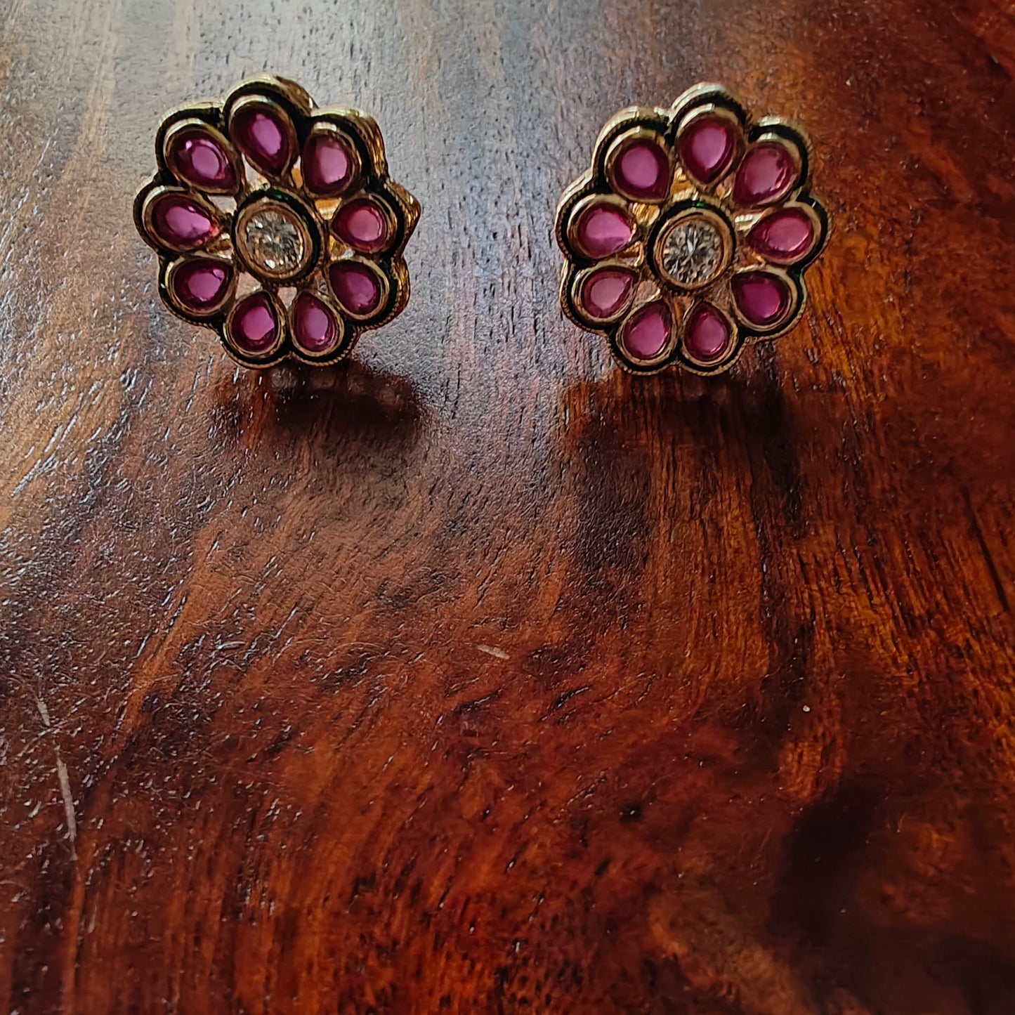 Studs in a flower motif with stones