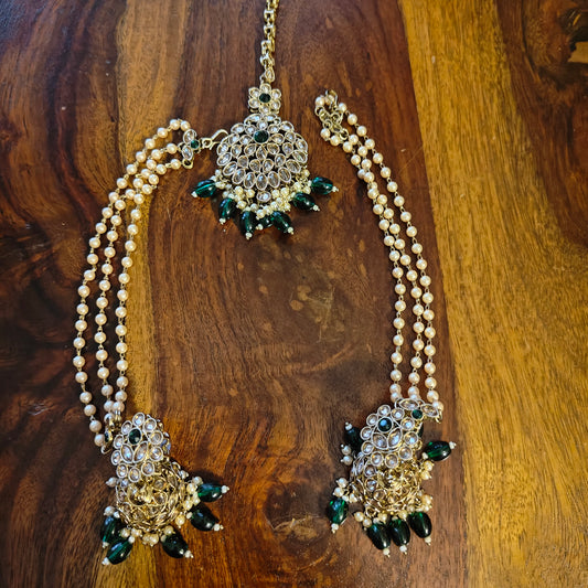 Big stone jhumkis(earrings),pearl chains,mang tikka