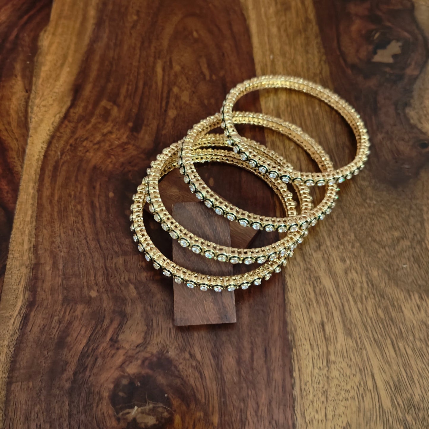 Stone bangles with green meenakari on round stones(4pc)