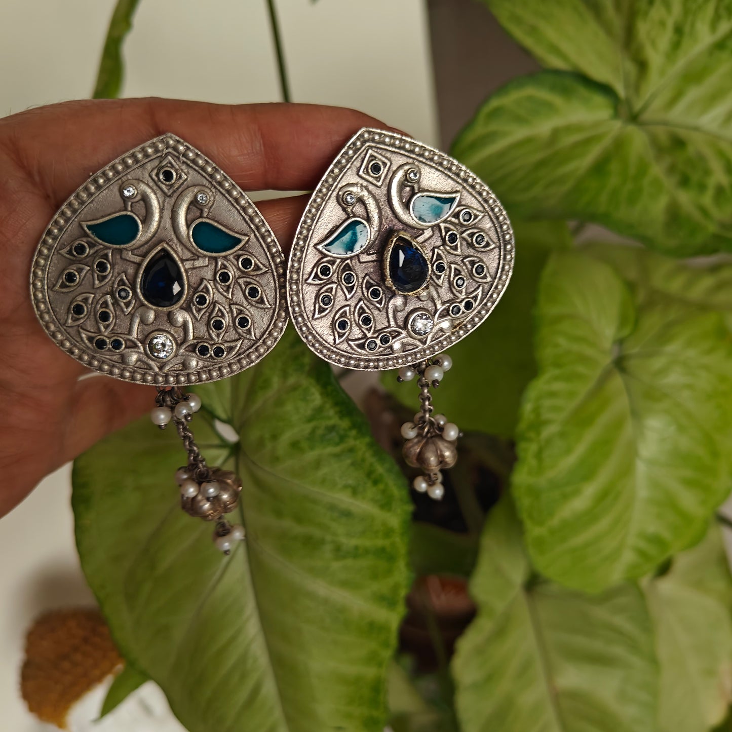 Earrings with engraving and stones