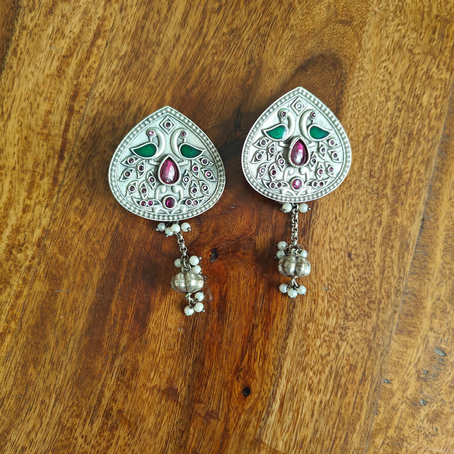 Earrings with engraving and stones