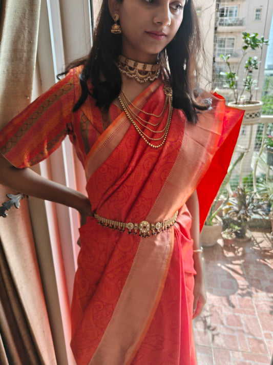 Golden belt with central round piece with kundan and stones hangings all over