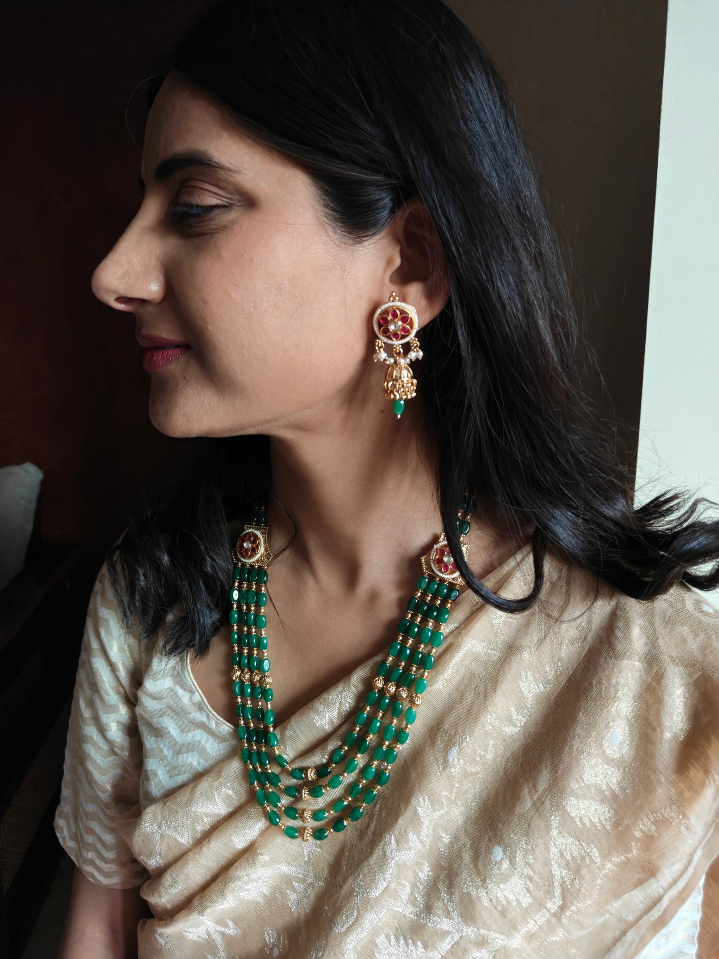 Riti emerald green stone and golden beads necklace set