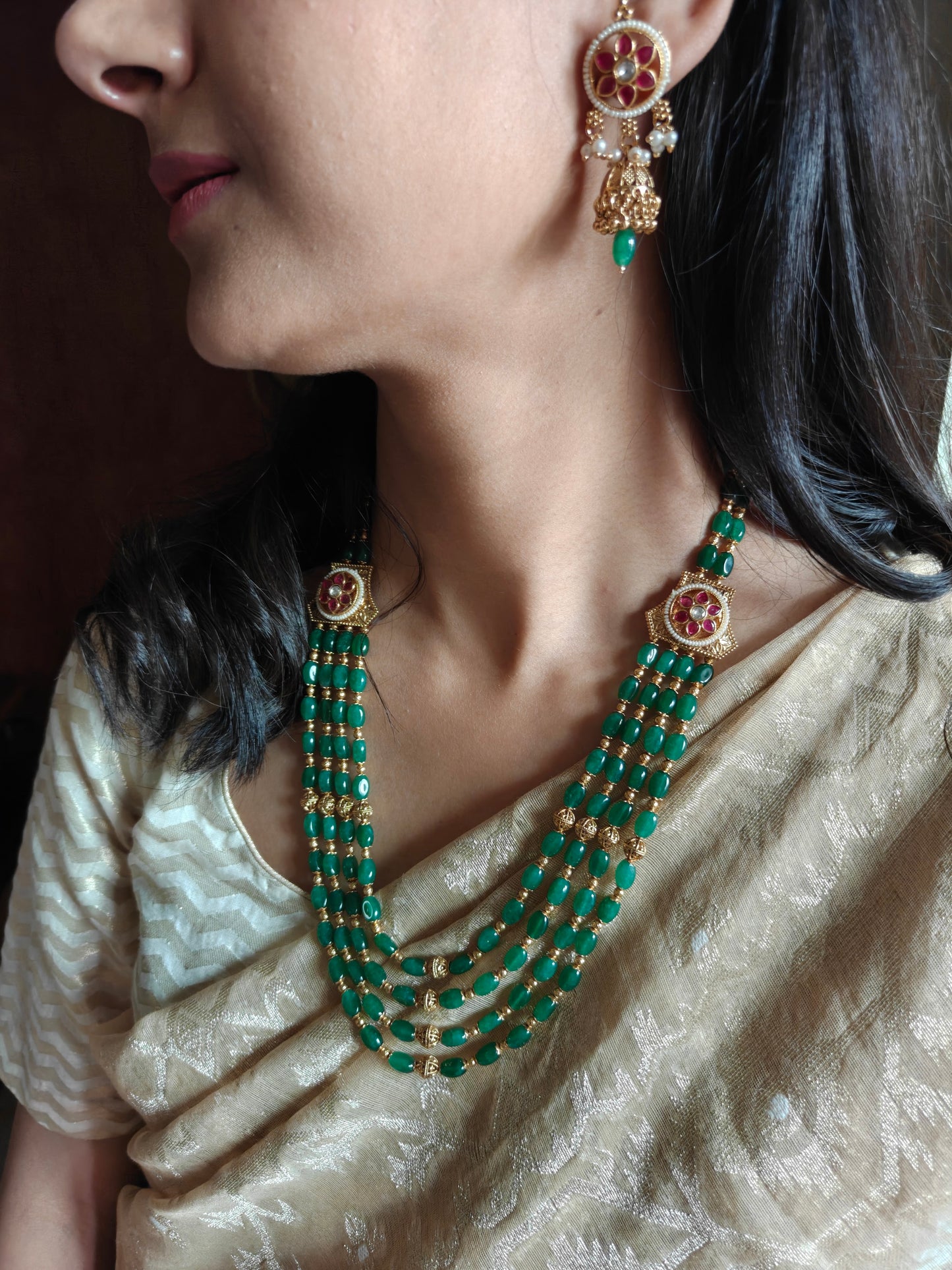 Riti emerald green stone and golden beads necklace set