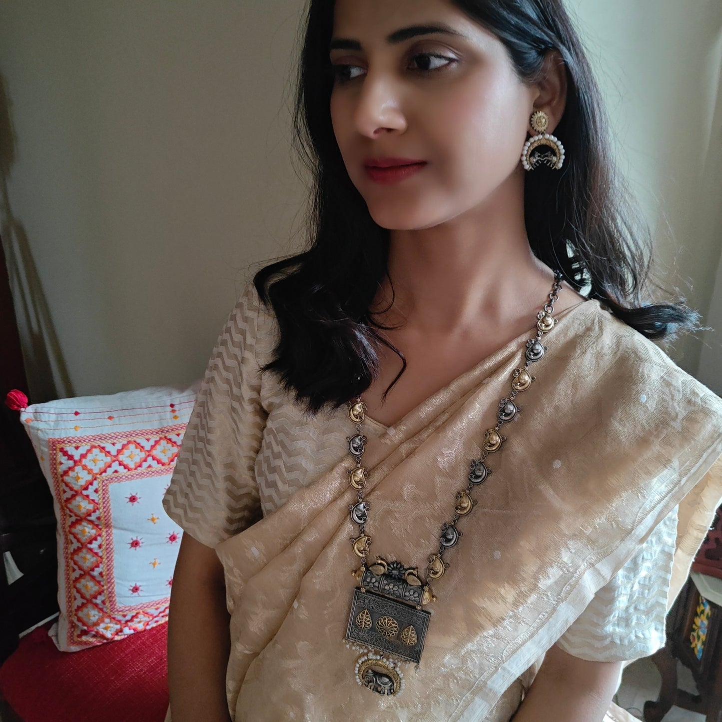 Dual tone set with elephant and peacock motif