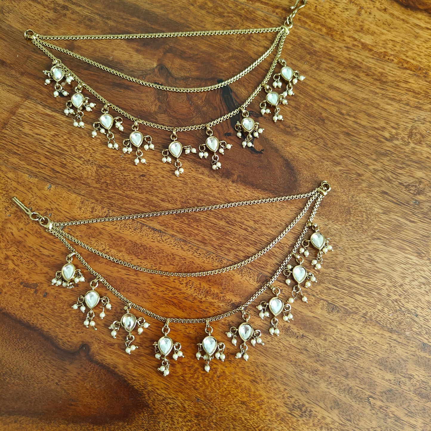 Earchains in antique finish with teardrop tyani kundan hangings
