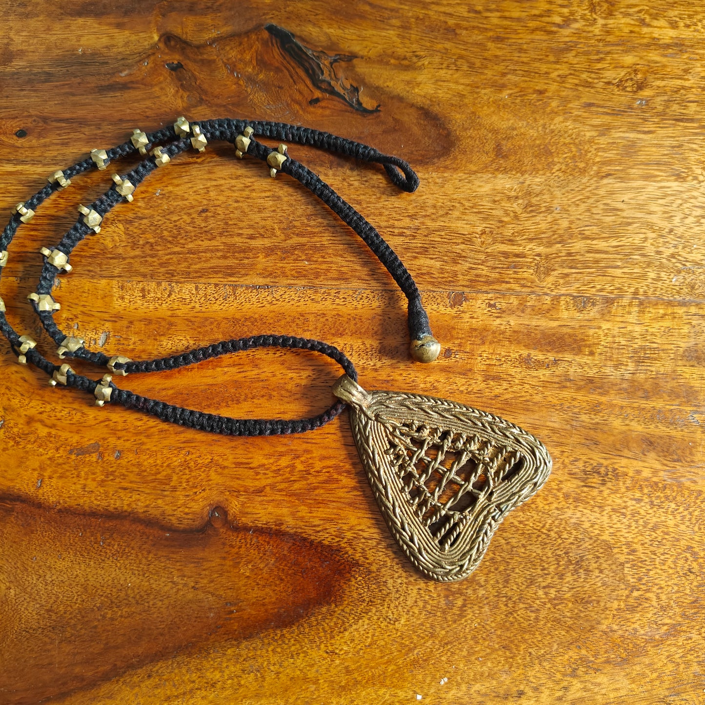 Tribal necklace with brass pendant