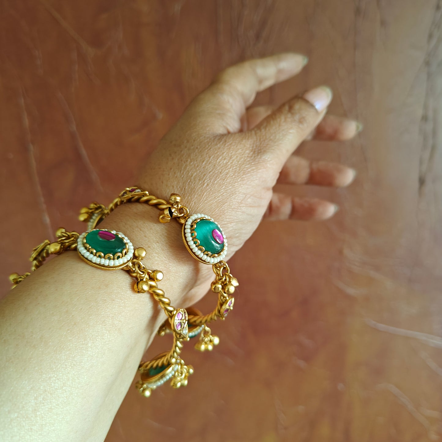 Golden bangles with green stone,ghungroos(2pc)