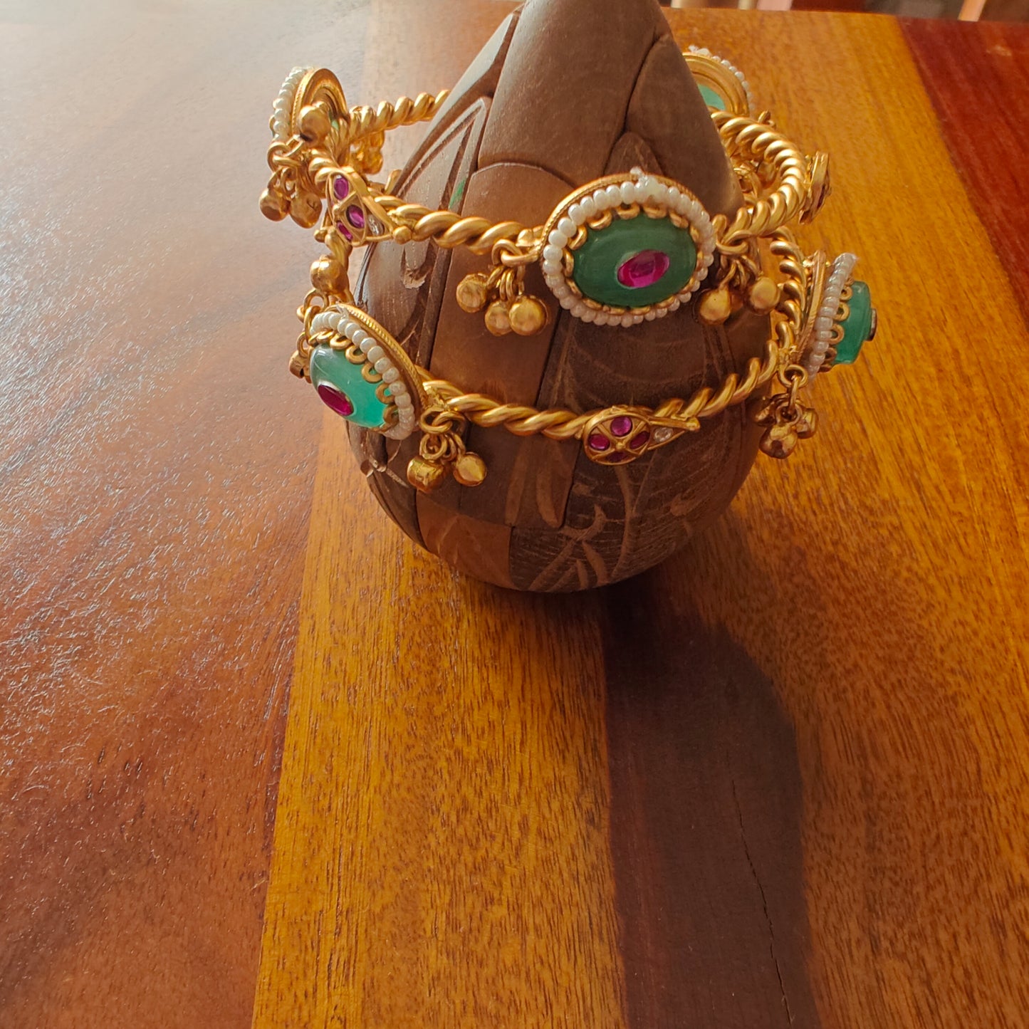 Golden bangles with green stone,ghungroos(2pc)