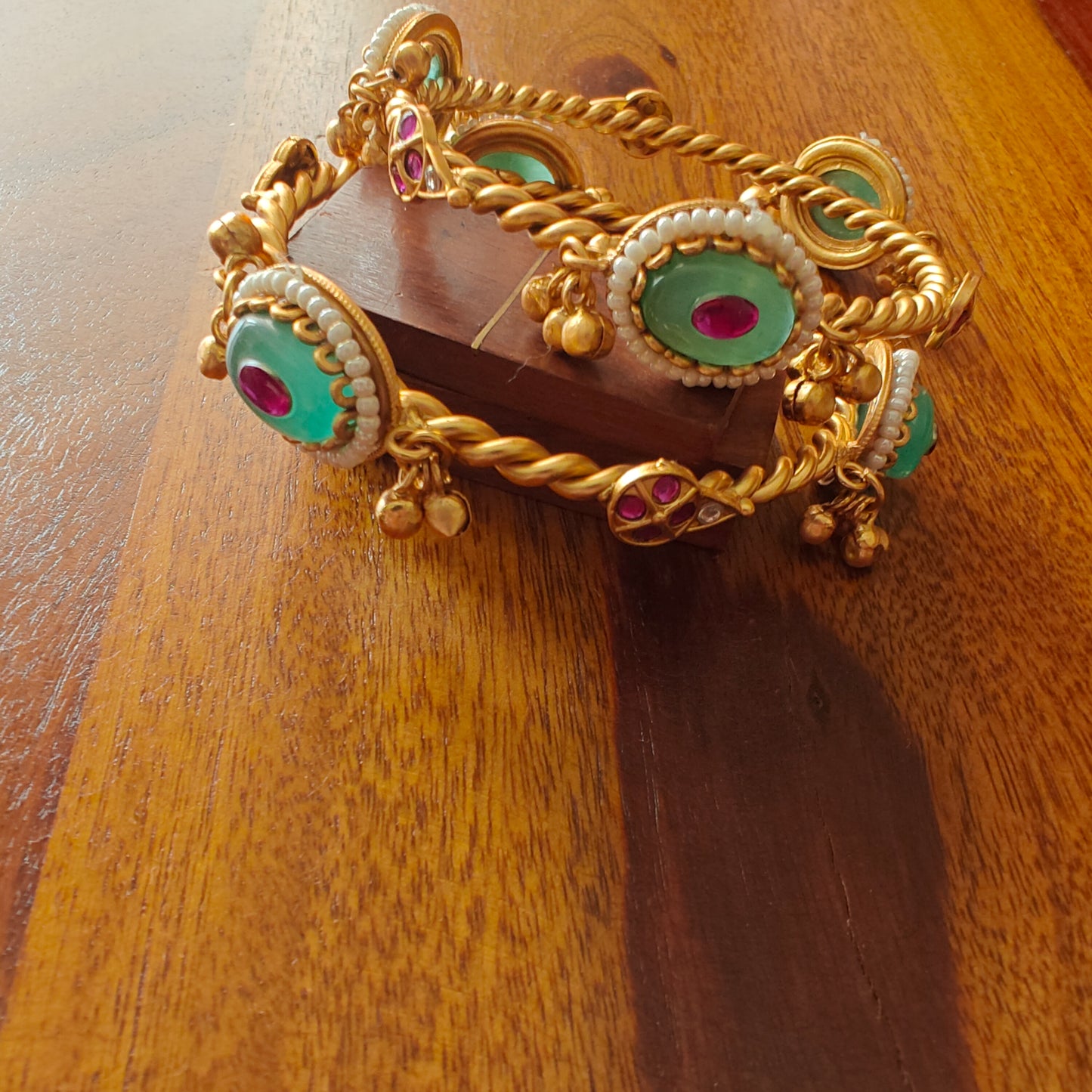 Golden bangles with green stone,ghungroos(2pc)