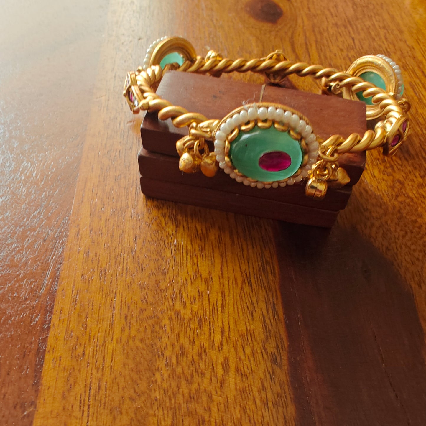 Golden bangles with green stone,ghungroos(2pc)