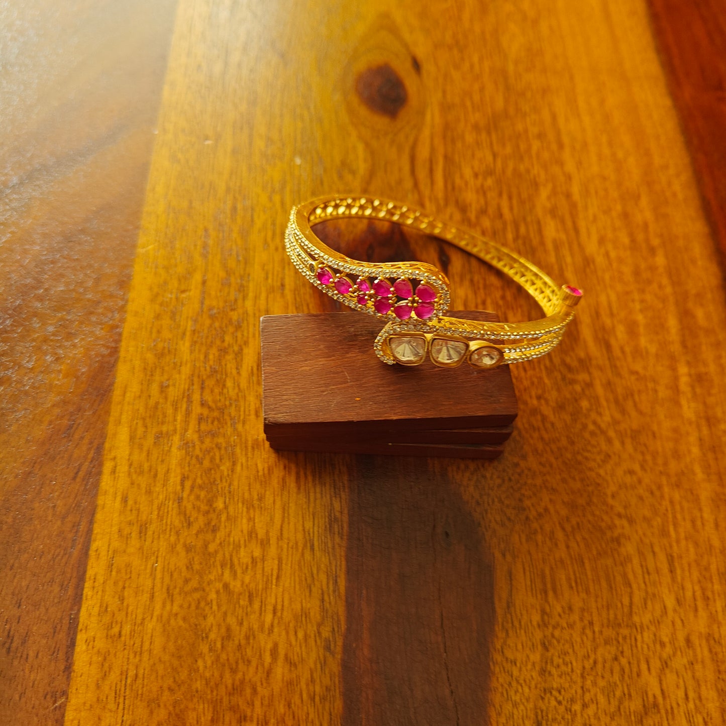 Gold kara with moissanite on one end and stones on the other(1 pc)