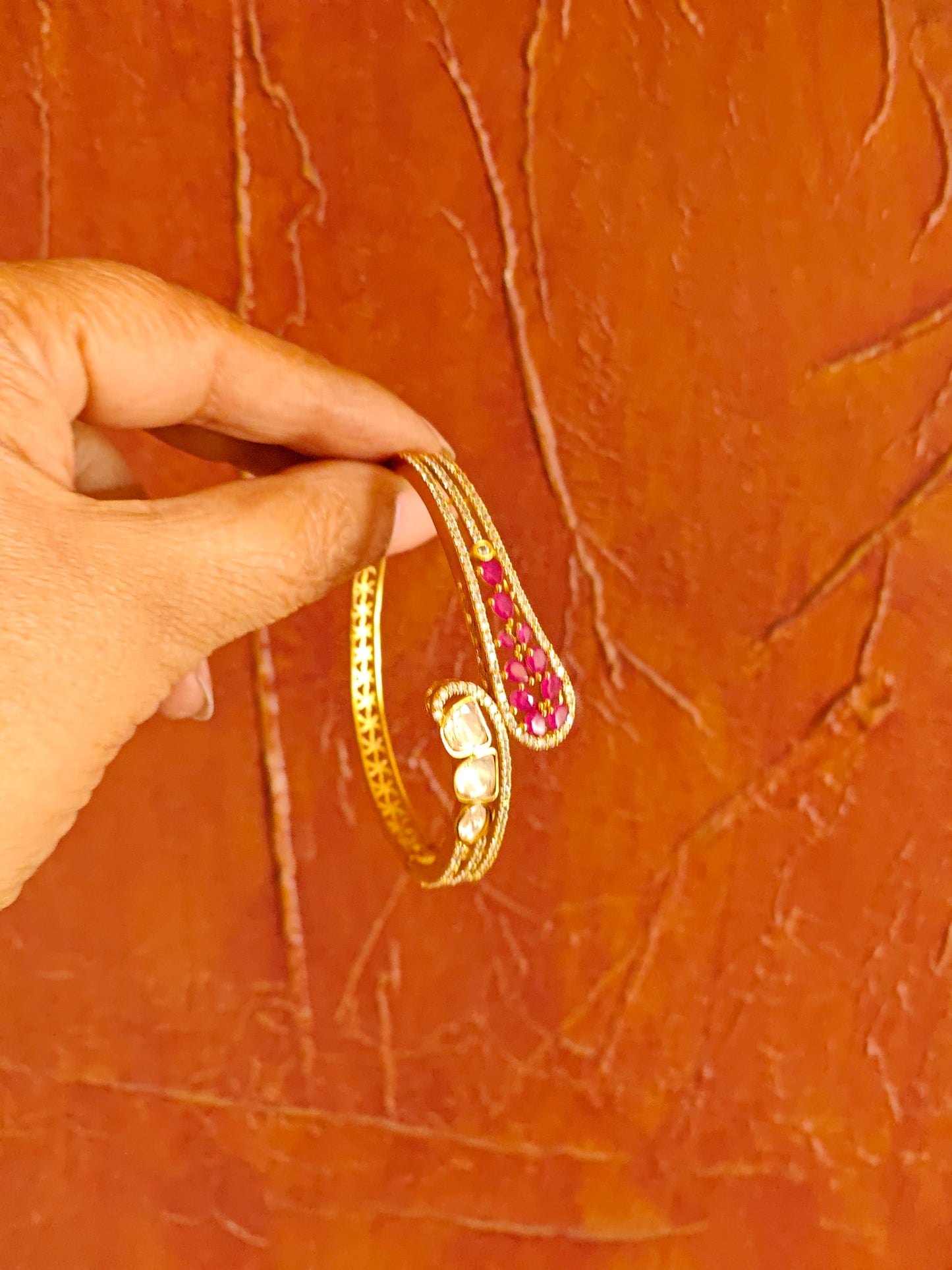 Gold kara with moissanite on one end and stones on the other(1 pc)