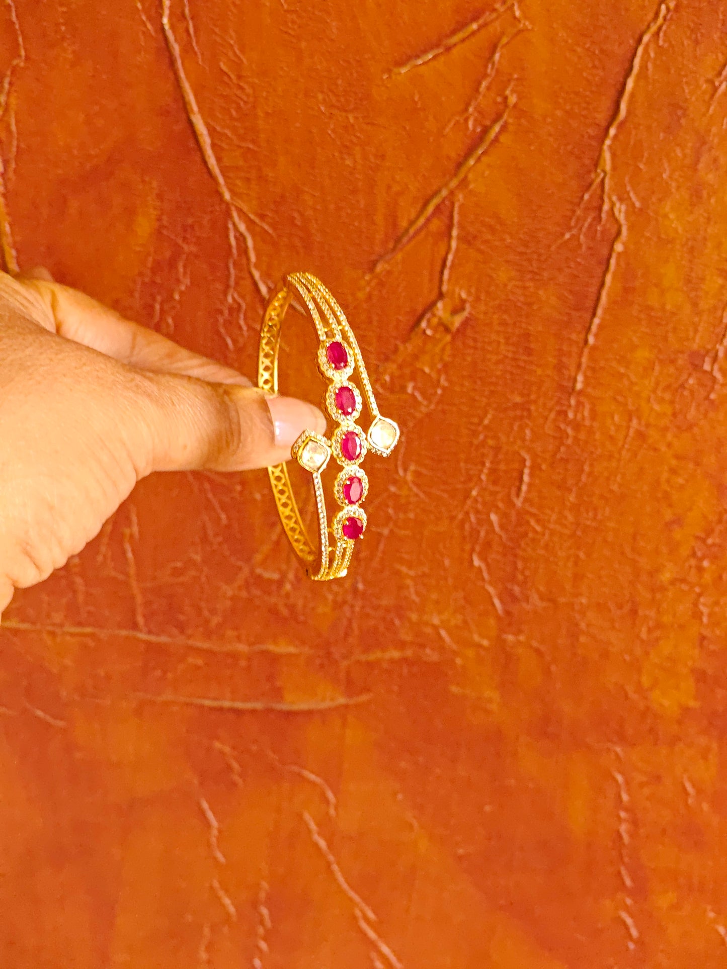 Gold kara with stones in the centre and moissanite on the side(1 pc)