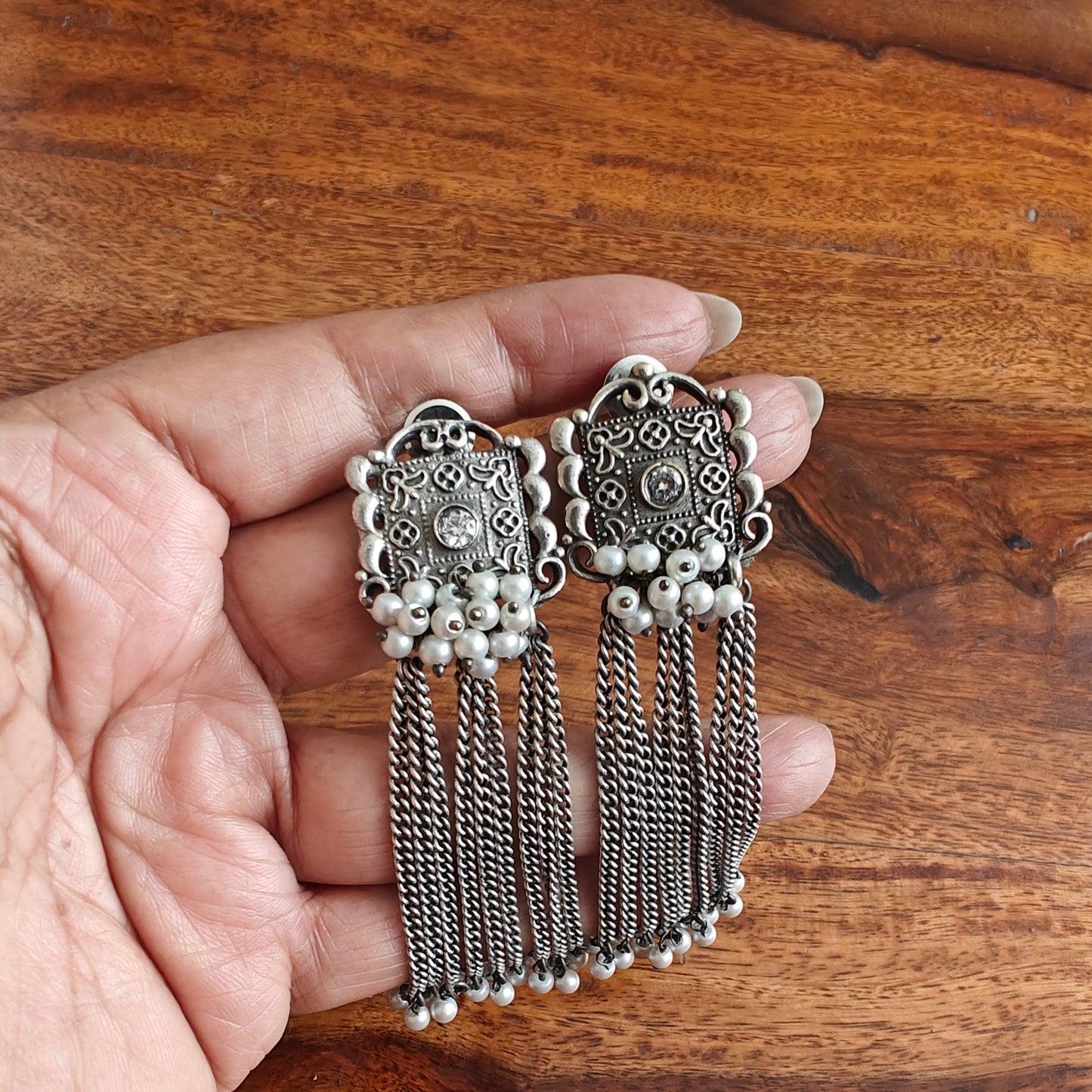 Earrings with square stud,pearl clusters below and chain hangings