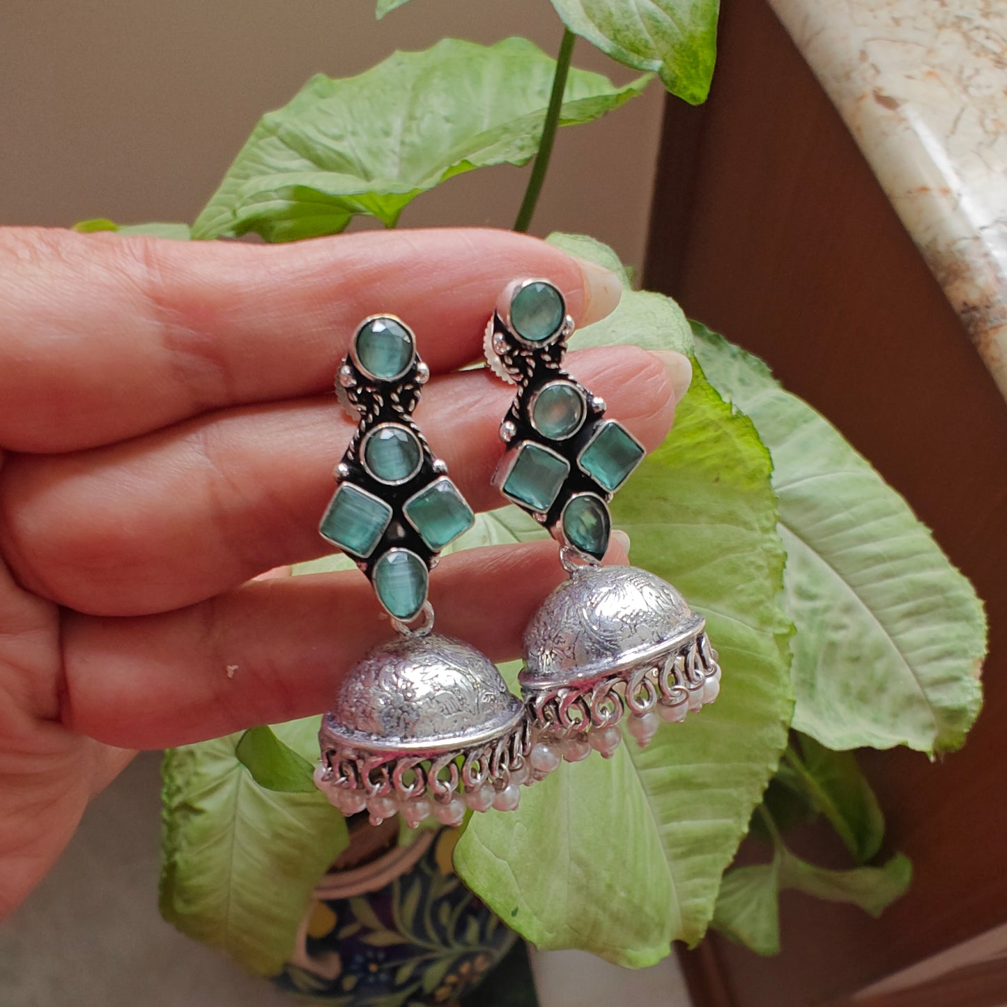 Stone earrings with jhumkis below