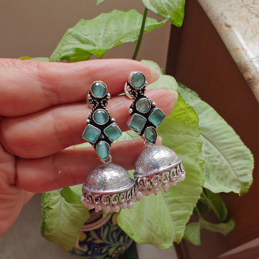 Stone earrings with jhumkis below