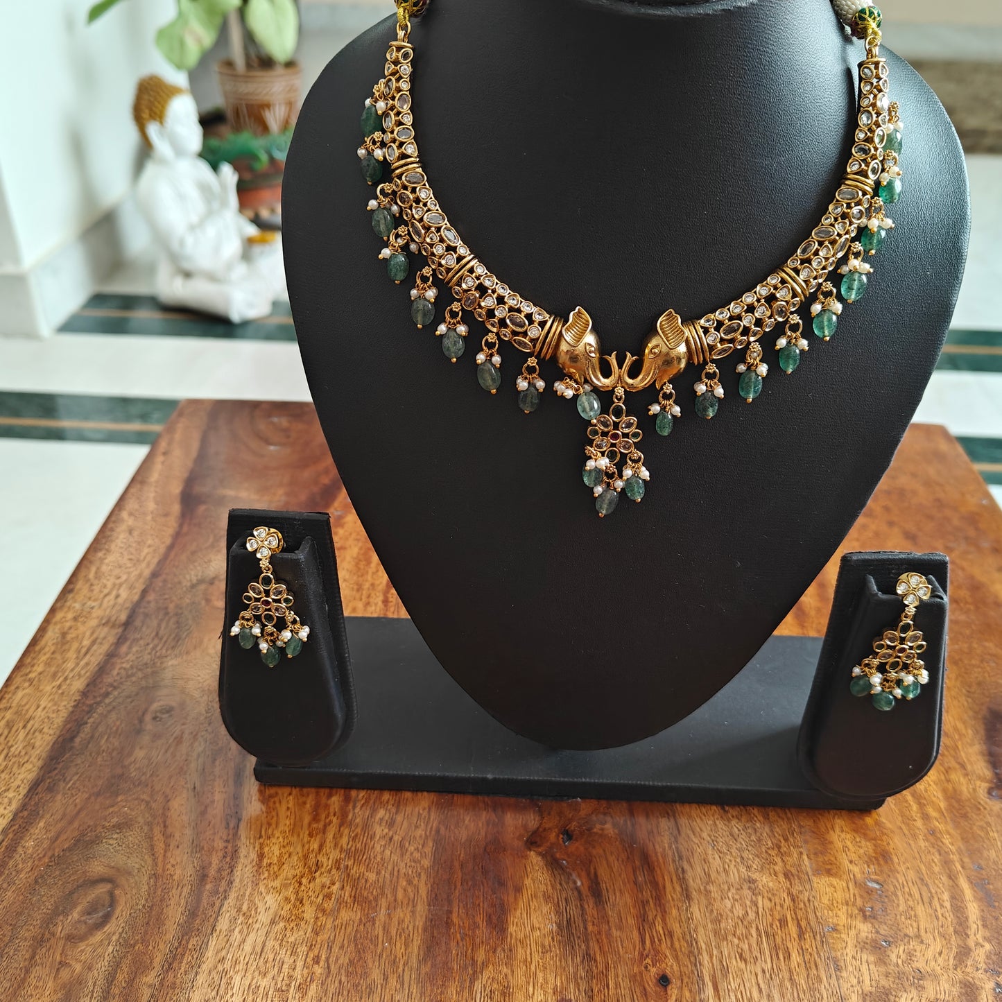 Ganesha hasli set with emerald green hangings