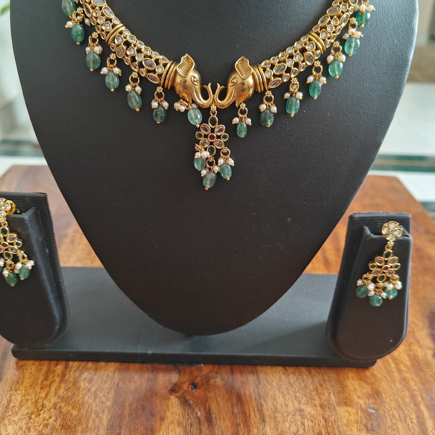 Ganesha hasli set with emerald green hangings