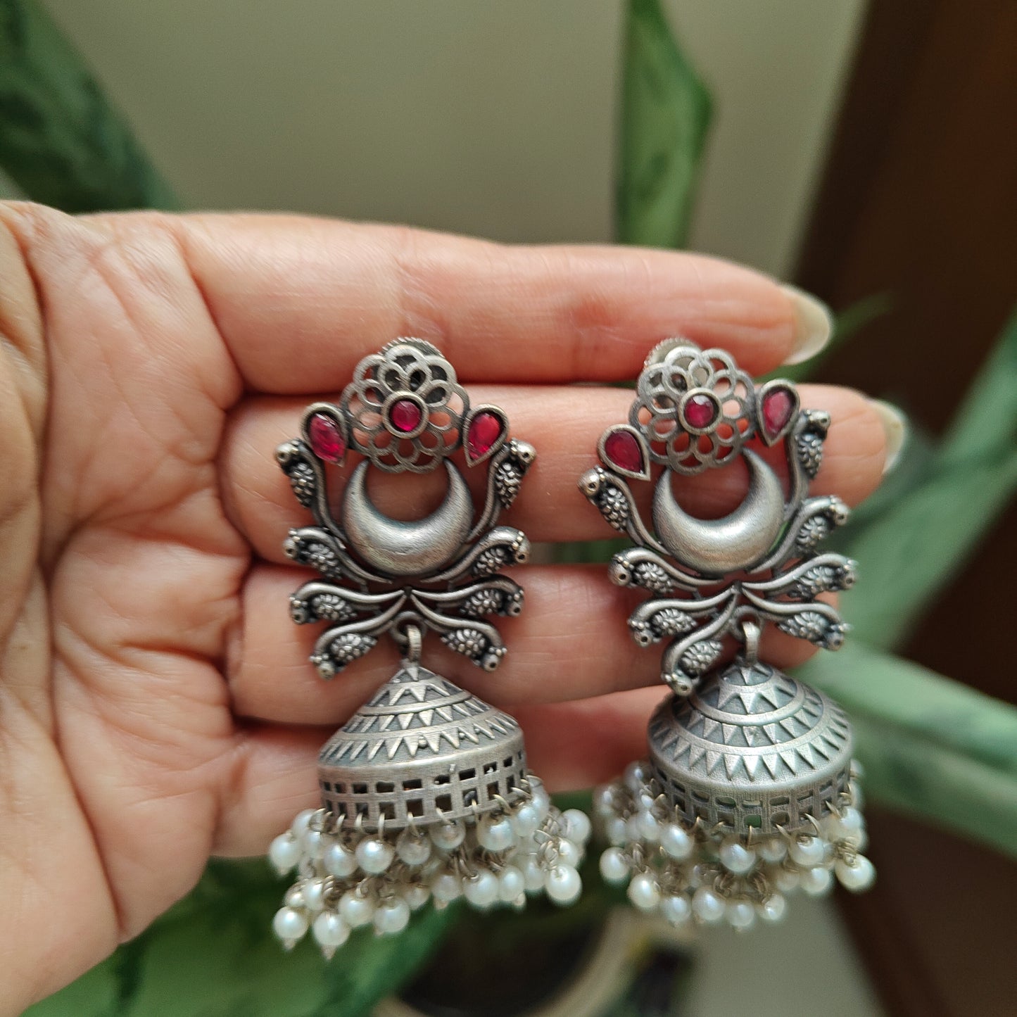 Jhumki's with pearls on peacock motif